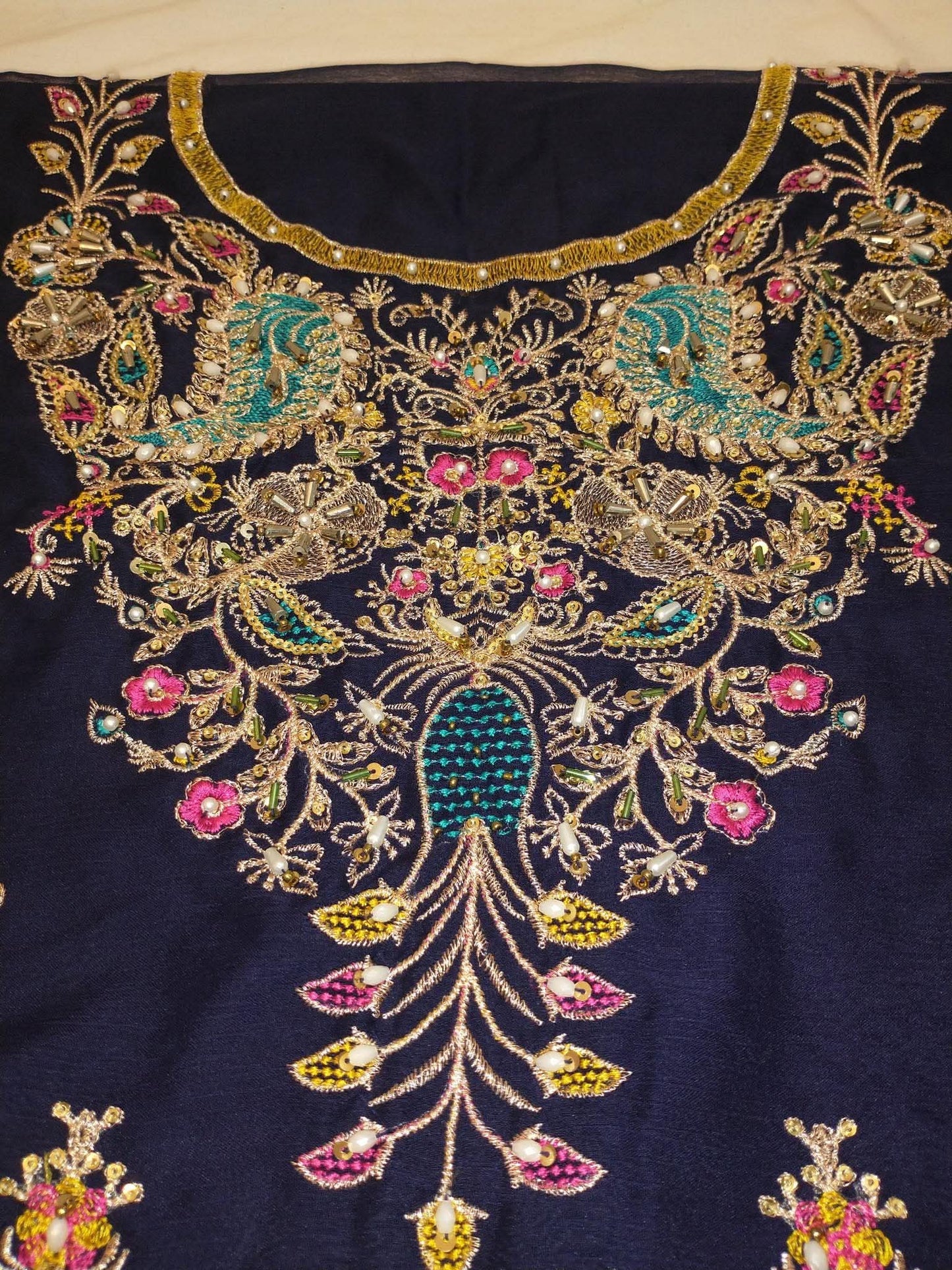 NUREH JUGNI HAND EMBELLISHED BLUE RED FANCY