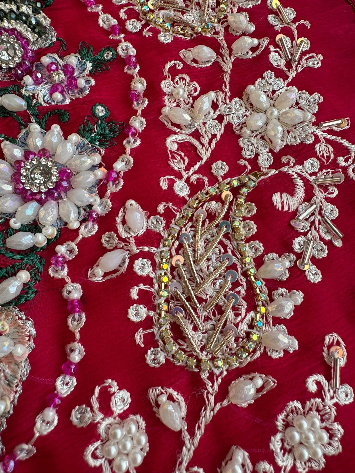Close-up of hand embellishment on Shocking Pink pure chiffon shirt