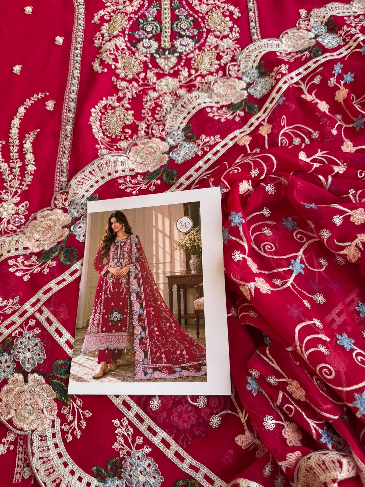 Model wearing pure chiffon hand embellished dress in Shocking Pink with chiffon dupatta